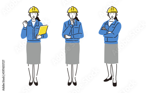 ヘルメットをかぶった作業服の女性全身