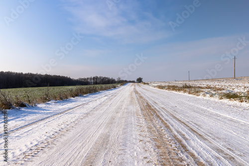 A road covered with snow and ice for cars