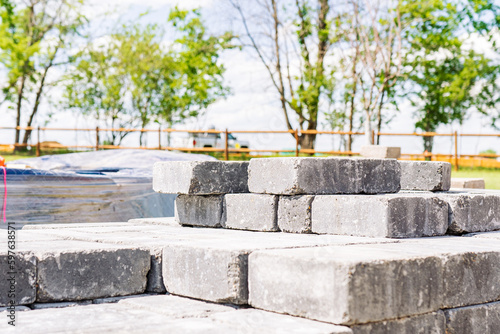 Obraz na płótnie A captivating image displaying the artistry of landscaping, with an array of beautiful rocks intricately arranged. This picture invites nature lovers and design enthusiasts to appreciate the harmony b w salonie