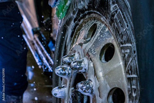 A bustling truck maintenance shop, providing comprehensive truck wash services and expert repair solutions for both trucks and trailers.