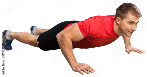 Fitness, sport, training smiling man doing push-ups