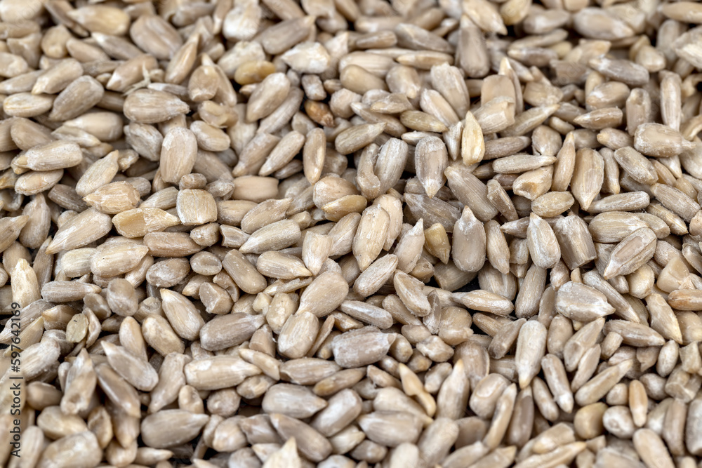 Sunflower seeds peeled from the black shell Sunflower seeds peeled from the black shell