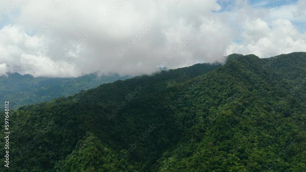 Mountains and green hills in Philippines. Slopes of mountains with evergreen vegetation. Negros. Mountains and green hills in Philippines. Slopes of mountains with evergreen vegetation. Negros.