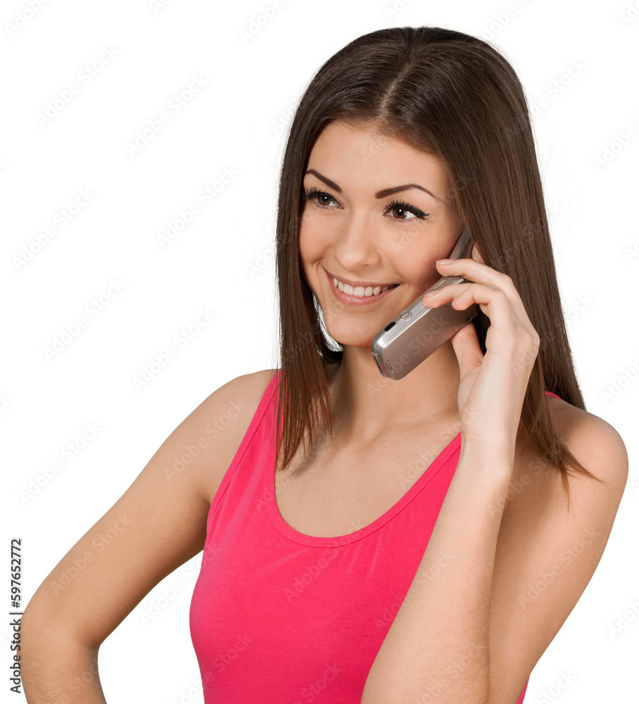 Friendly Young Woman Talking on Phone - Isolated Friendly Young Woman Talking on Phone - Isolated