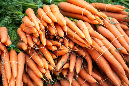 Pile of orange carrots at farmers market