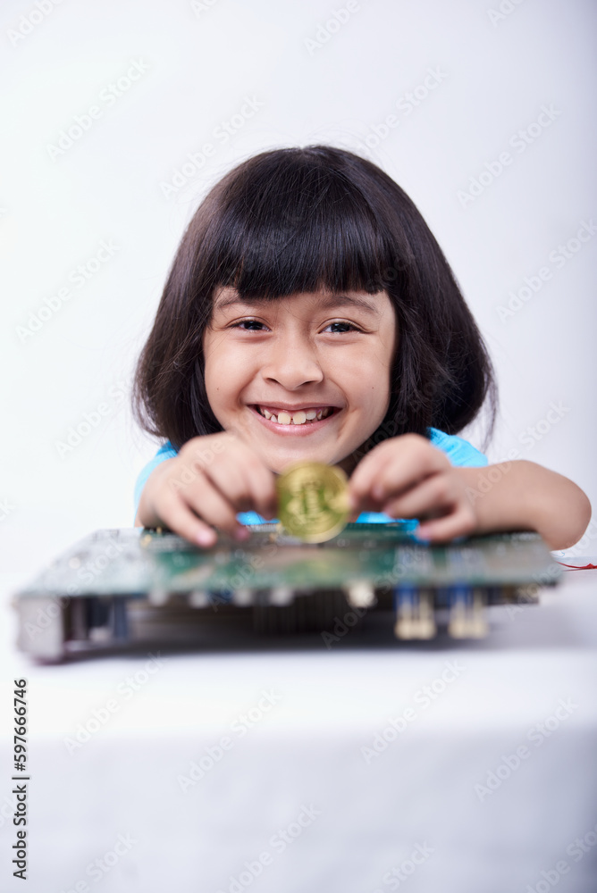 child girl showing cryptocurrency coin on hand child girl showing cryptocurrency coin on hand