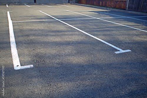 An empty parking lot in the early spring morning