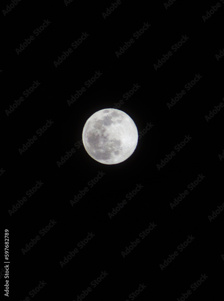 full moon in black background with space for text full moon in black background with space for text