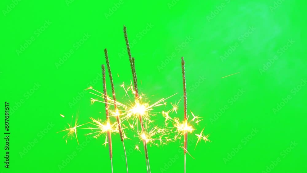 Firework burning and spark on green screen background Firework burning and spark on green screen background