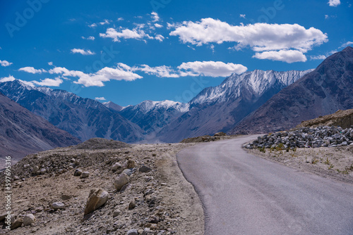 road with two sides are high mountains, and blue sky. Beautiful scenery on the way to pangong lake, Leh, Ladakh, Jammu and Kashmir, India