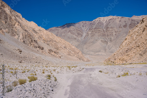 beautiful scenery road to Pangong lake with mountain and blue sky at Ladakh, India