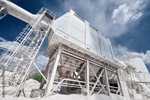 Dedusting equipment to clean furnace gases under blue sky photo