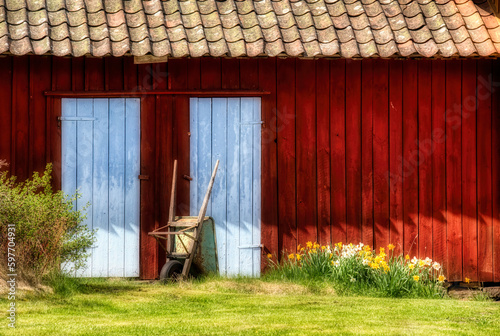 Detail of a Small Barn and an Old Wheelbarrow on Southern Koster Island, Sweden photo