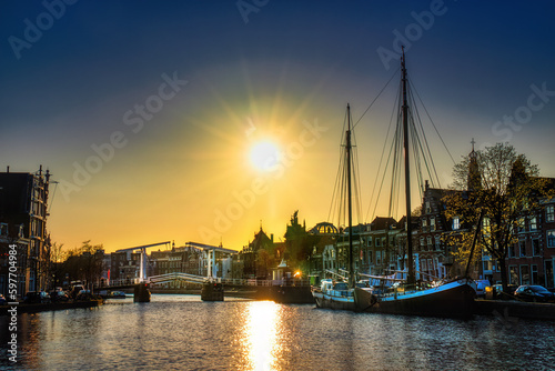 The Binnen Spaarne Canal Running through Haarlem, the Netherlands, with the Famous Gravestenenbrug, in the Afternoon Sun