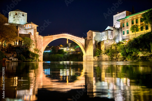 Fényképezés Night Shot of the Famous Old Bridge (Stari Most) Crossing the River Neretva in M