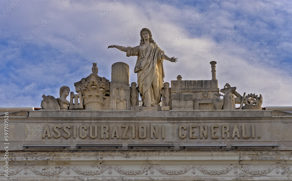 Naklejka premium statues on top of the building trieste
