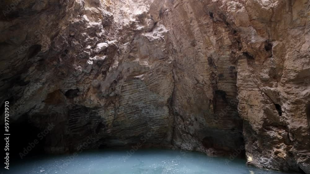 Turquoise-green lake in the Proval cave, on the southern slope of mount Mashuk. Proval Cave in Pyatigorsk. Lake with turquoise water in a cave. Underground lake Proval. failure in piatigorsk Turquoise-green lake in the Proval cave, on the southern slope of mount Mashuk. Proval Cave in Pyatigorsk. Lake with turquoise water in a cave. Underground lake Proval. failure in piatigorsk