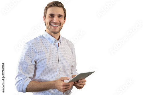 Handsome businessman using his tablet standing on a transparent background photo