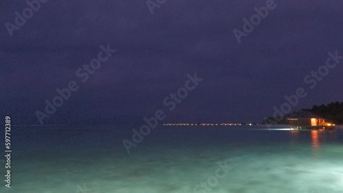 Timelapse on Maledives Island Meeru, Thunder at sky photo