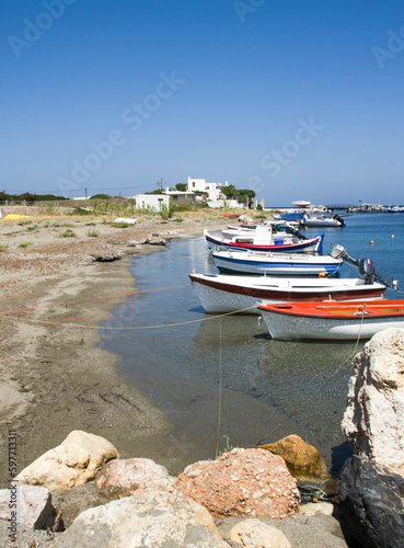 Tranquil scene os small fishing rboats in the harbor of Skyros island , Greece