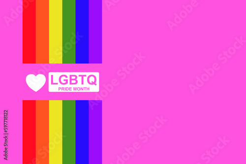 LGBTQIA PRIDE MONTH Text on a bright rainbow flag, a pride month for lesbian, gay, bisexual, transgender, human rights and tolerance.