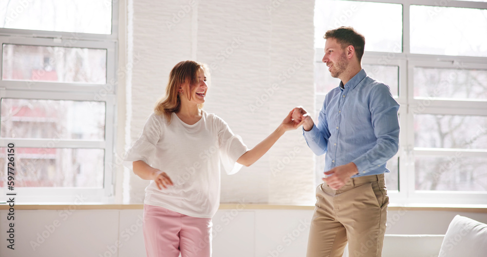 Fototapeta premium Excited Family Couple Dancing. People Dance