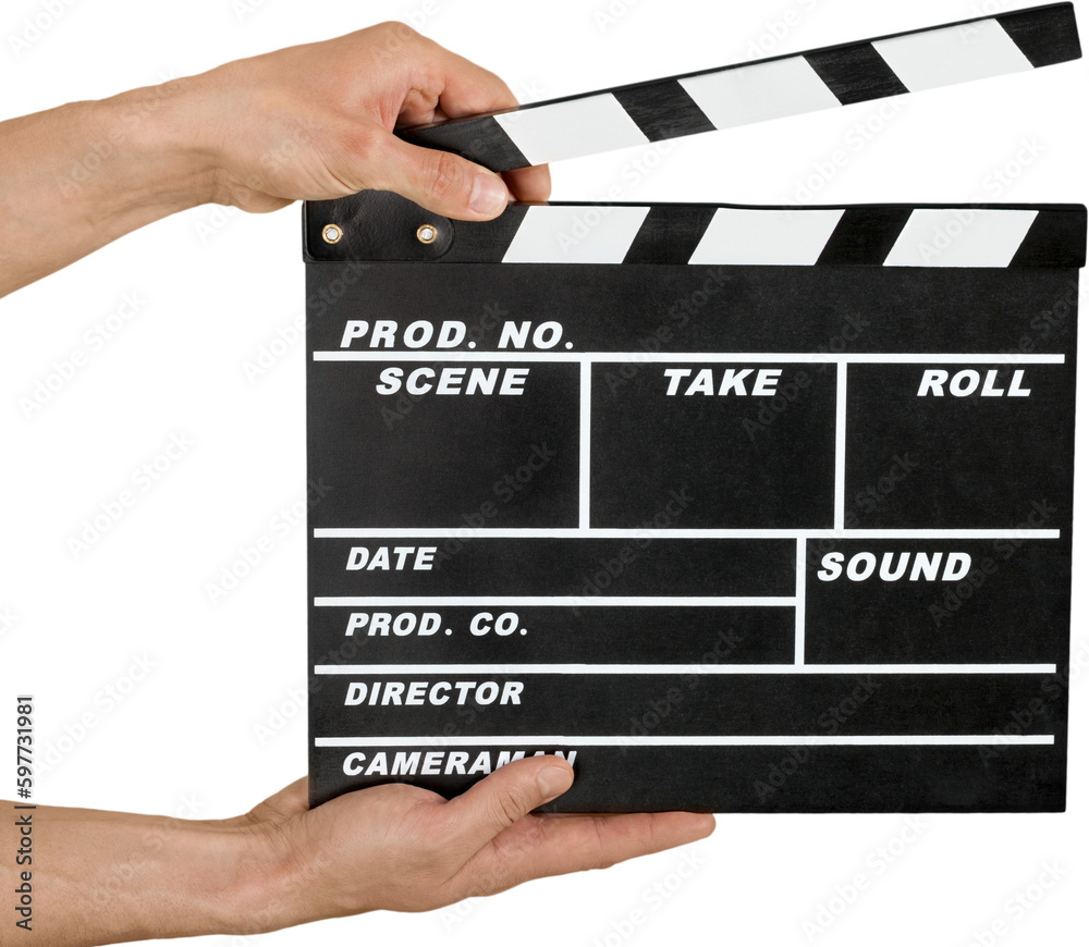 Fototapeta premium Human hand holds movie clapper board