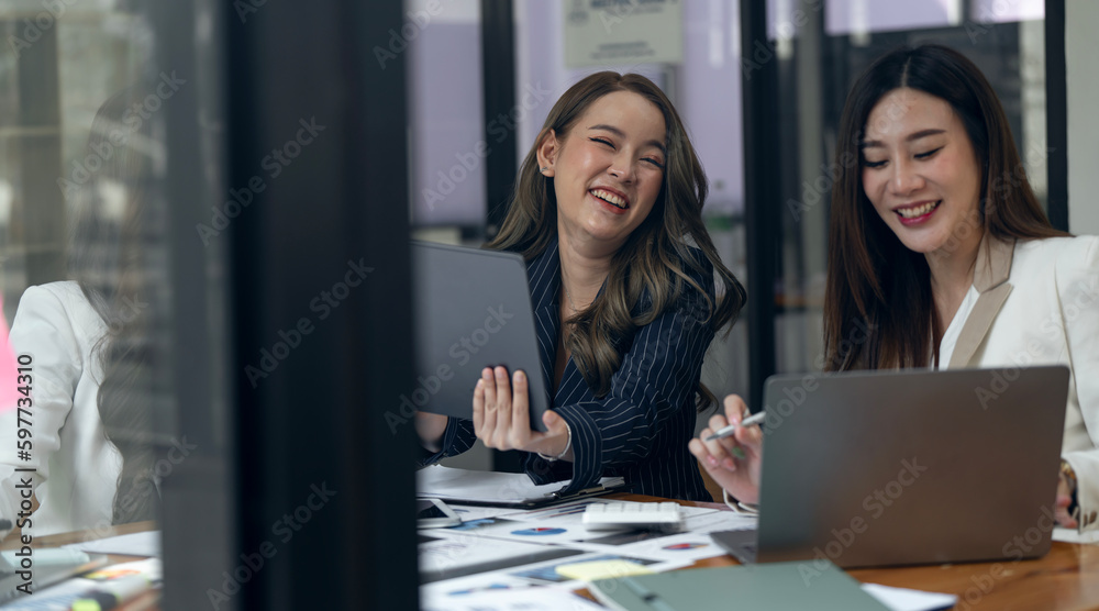 Group of young creative businesswoman working together at office. Group of young creative businesswoman working together at office.