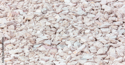 Stone pebbles as an abstract background. Texture.