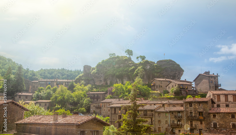 Rupit, a medieval village in the middle of nature on soft sun light, Catalonia, Osona. Rupit, a medieval village in the middle of nature on soft sun light, Catalonia, Osona.