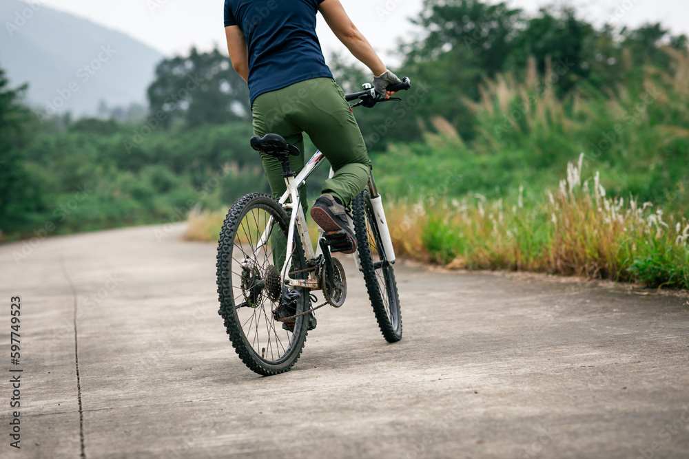 Riding bike in spring forest