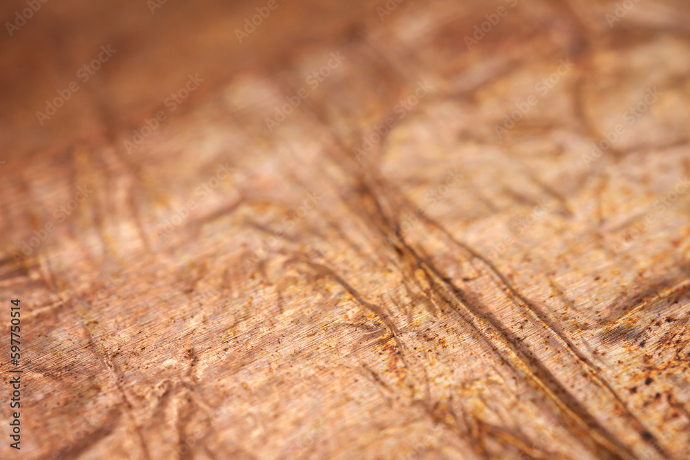 Extreme closeup of crumpled brass foil texture Extreme closeup of crumpled brass foil texture