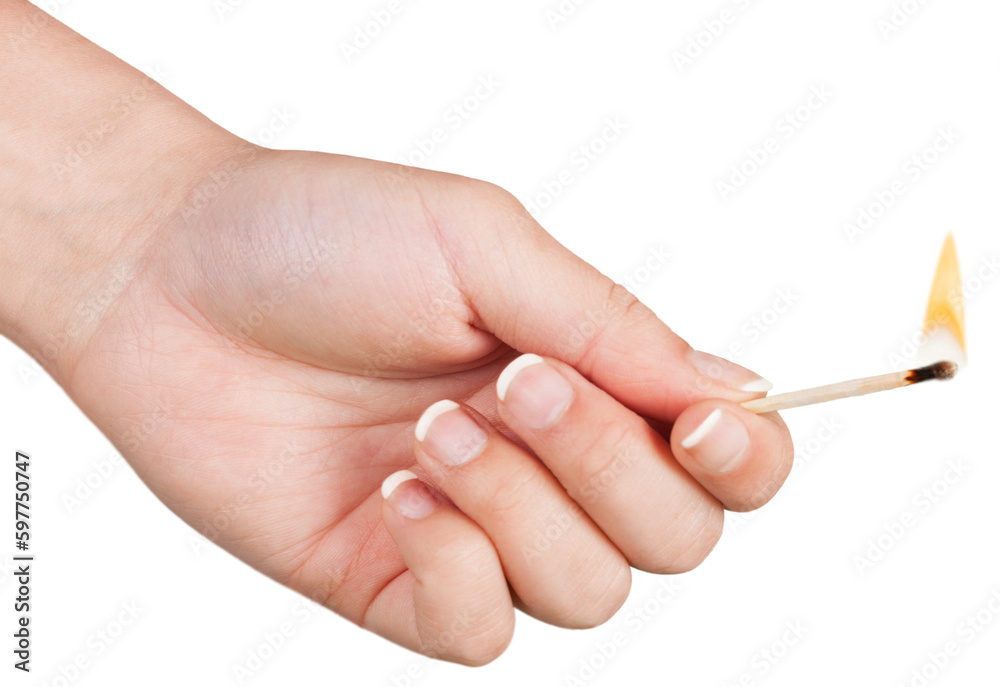 Burning Match in woman hand Burning Match in woman hand
