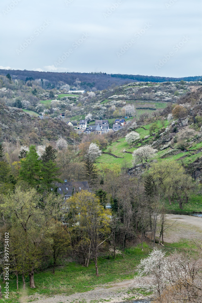 Fototapeta premium The roads wind through a stunning patchwork of farmland, beautiful villages and green lush forests.