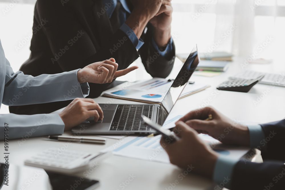 © pornpirose suparit - Businessman is reviewing monthly sales documents for analysis and marketing plans for more sales growth, they are the founders of young companies co-founding startups. Sales management concept. © pornpirose suparit - Businessman is reviewing monthly sales documents for analysis and marketing plans for more sales growth, they are the founders of young companies co-founding startups. Sales management concept.