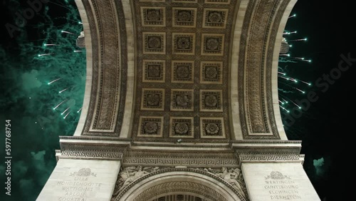 Celebratory fireworks over the Arc de Triomphe ( 4K, time lapse), Paris, France. The walls of the arch are engraved with the names of 128 battles and names of 660 French military leaders (in French)  photo