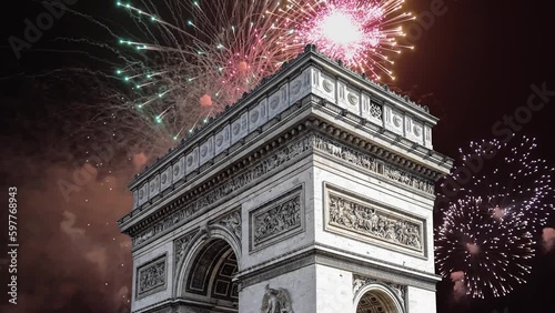 Celebratory fireworks over the Arc de Triomphe ( 4K, time lapse), Paris, France. The walls of the arch are engraved with the names of 128 battles and names of 660 French military leaders (in French)  photo