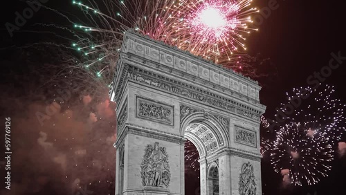 Celebratory fireworks over the Arc de Triomphe ( 4K, time lapse), Paris, France. The walls of the arch are engraved with the names of 128 battles and names of 660 French military leaders (in French)  photo