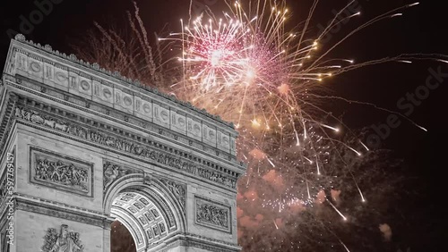 Celebratory fireworks over the Arc de Triomphe ( 4K, time lapse), Paris, France. The walls of the arch are engraved with the names of 128 battles and names of 660 French military leaders (in French)  photo