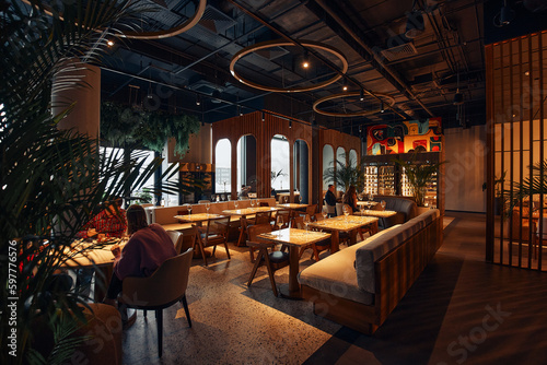 Elegant decorated restaurant with rich table settings