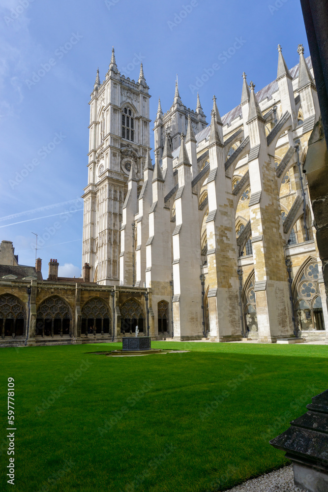 Westminster Abbey seen from the cloisters inside, on a sunny day.
