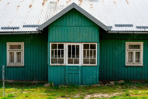 old green wooden cottage