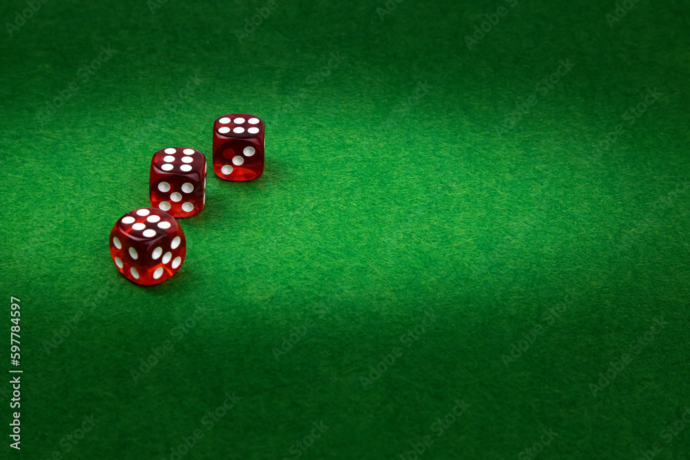 Dice on green felt, gambling background concept Dice on green felt, gambling background concept