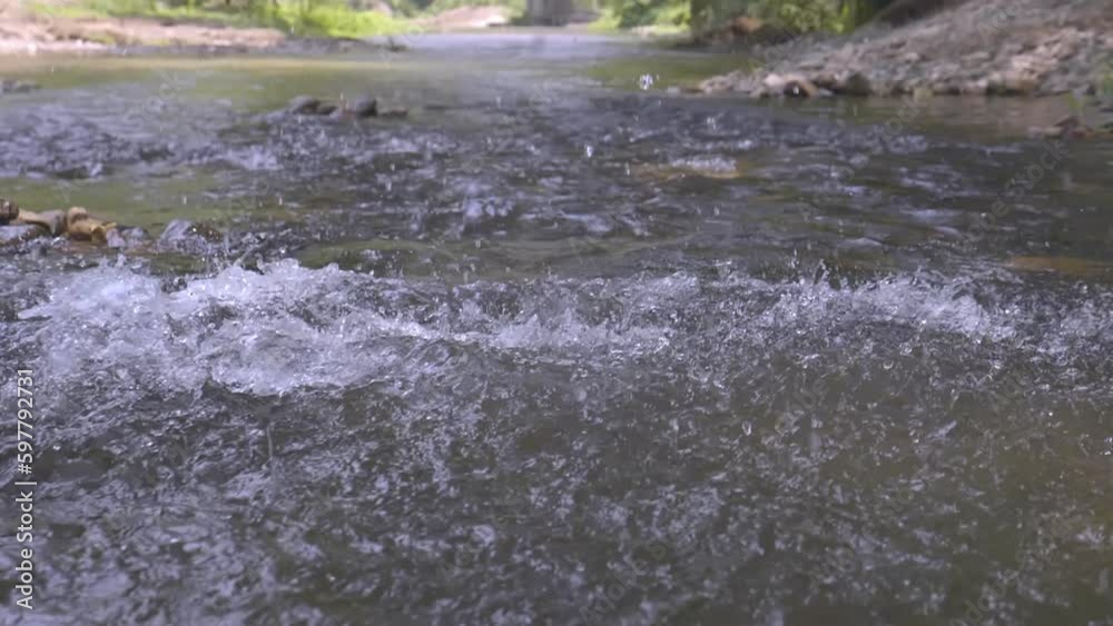 Rocks fell into the river and the water exploded. Rocks fell into the river and the water exploded.