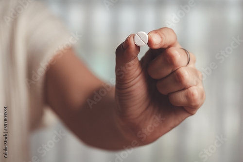 Asian woman's hand holding ...
