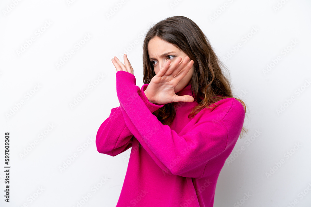 Young caucasian woman isolated on white background nervous stretching hands to the front Young caucasian woman isolated on white background nervous stretching hands to the front