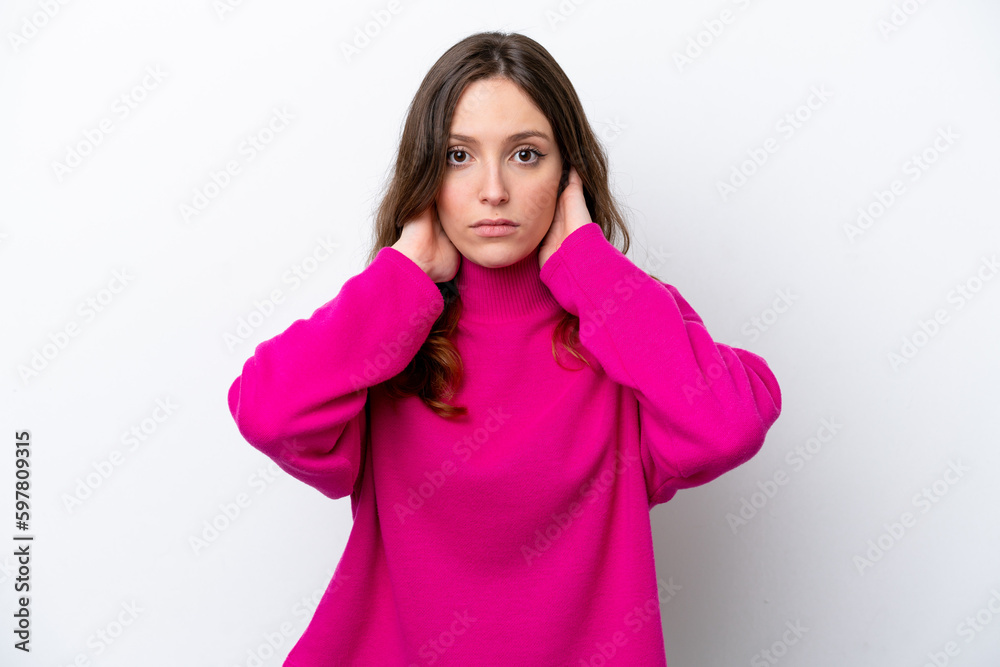 Young caucasian woman isolated on white background frustrated and covering ears Young caucasian woman isolated on white background frustrated and covering ears