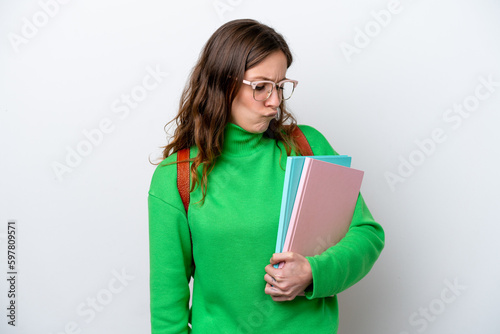 Young student caucasian woman isolated on white background with sad expression