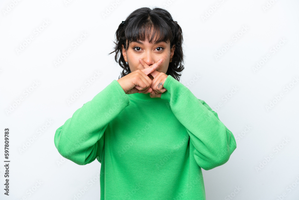 Young Argentinian woman isolated on white background showing a sign of silence gesture Young Argentinian woman isolated on white background showing a sign of silence gesture