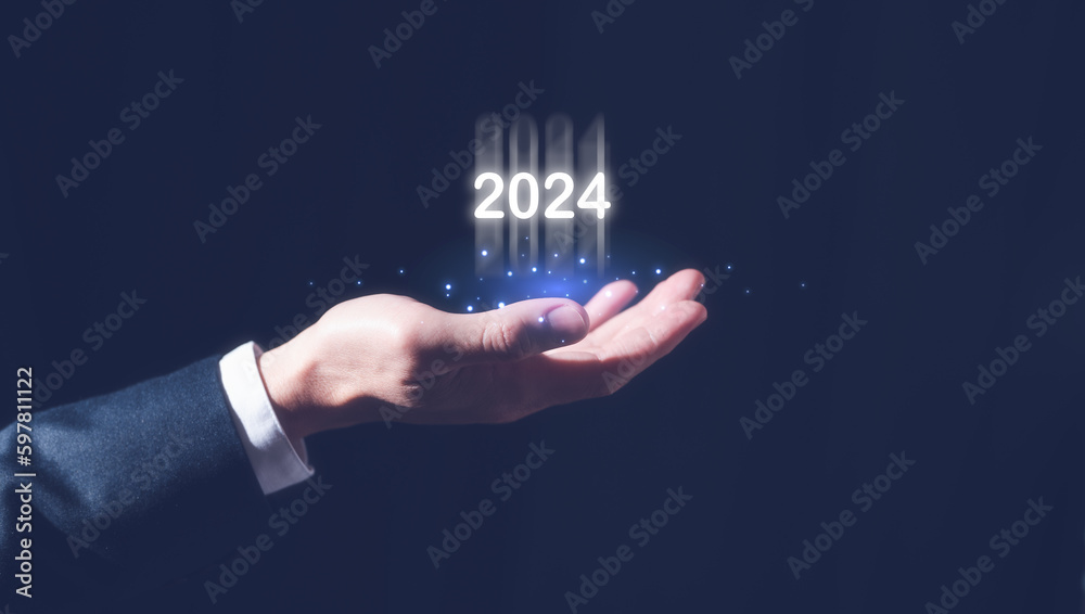2024 business planning and strategy concept, businessman holding virtual icon of the year 2024, marketing financial and research analysis, investment trends next new year 2024 business planning and strategy concept, businessman holding virtual icon of the year 2024, marketing financial and research analysis, investment trends next new year